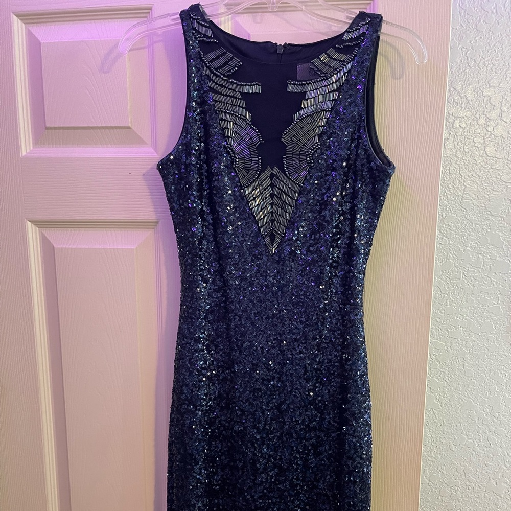 Long dark blue sequence dress with beading at the top